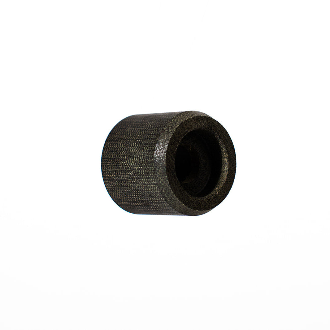 A black textured cylindrical sleeve or bushing with a hollow center, shown on a plain white background.