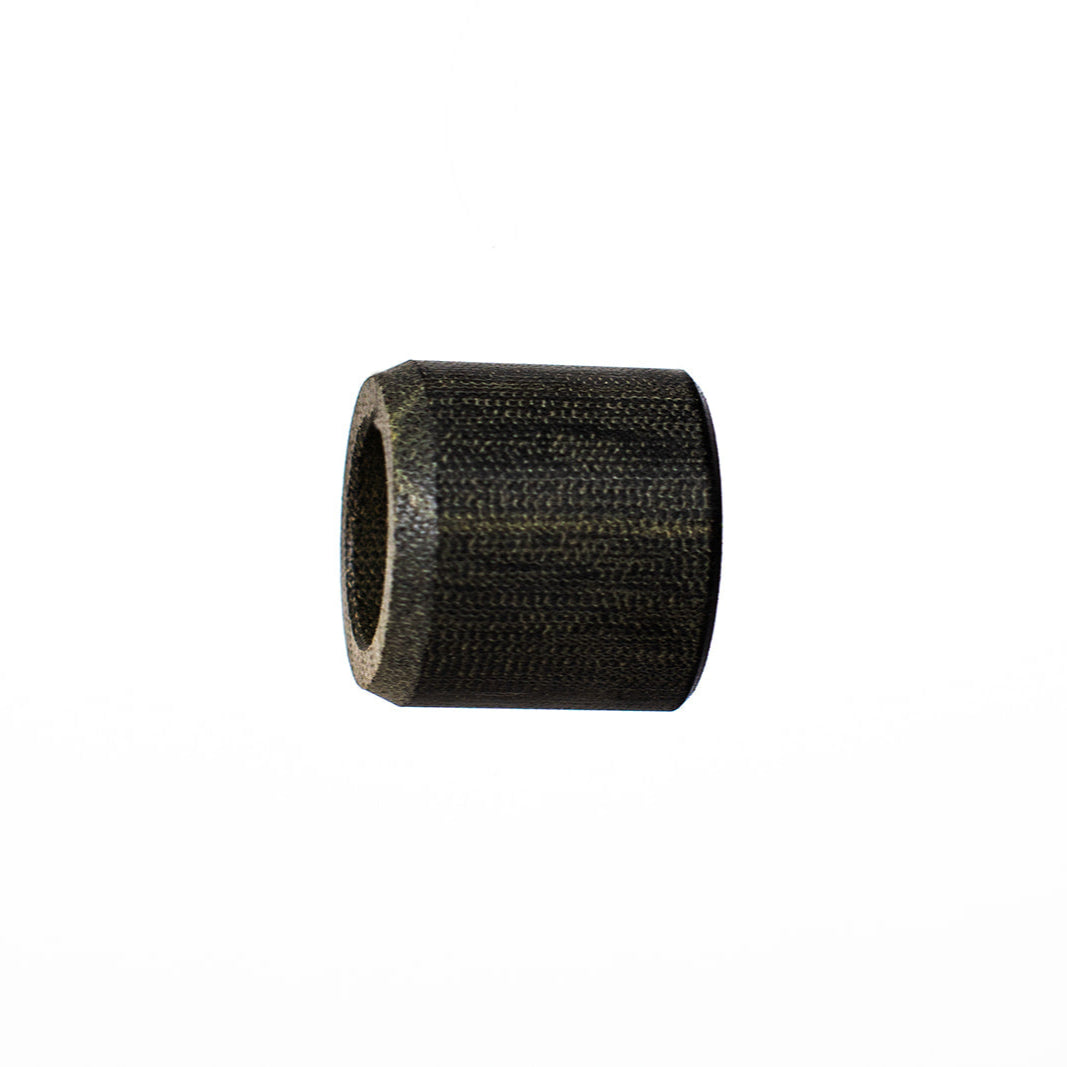 A small cylindrical black textured component with a hollow center, isolated on a plain white background.