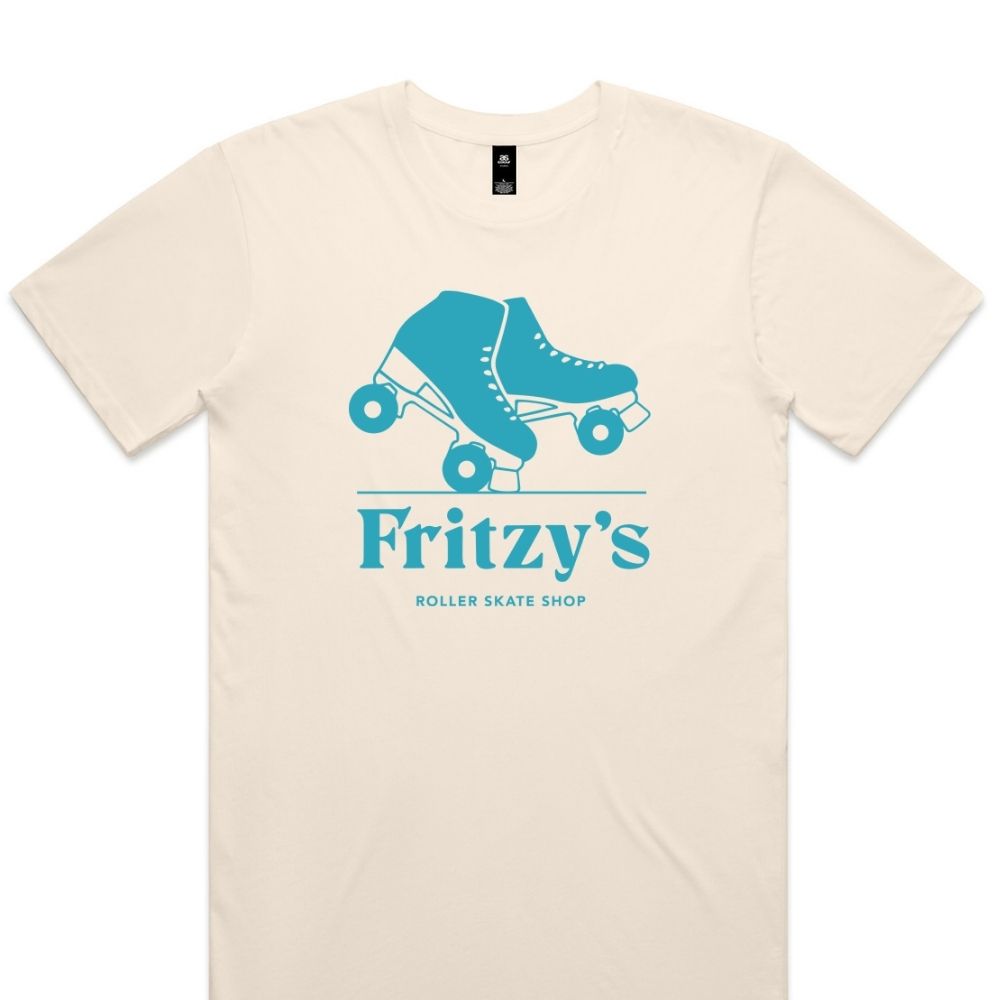 An off-white short-sleeve crewneck t-shirt featuring a teal graphic of a roller skate and the text 'Fritzy's Roller Skate Shop' printed on the front.